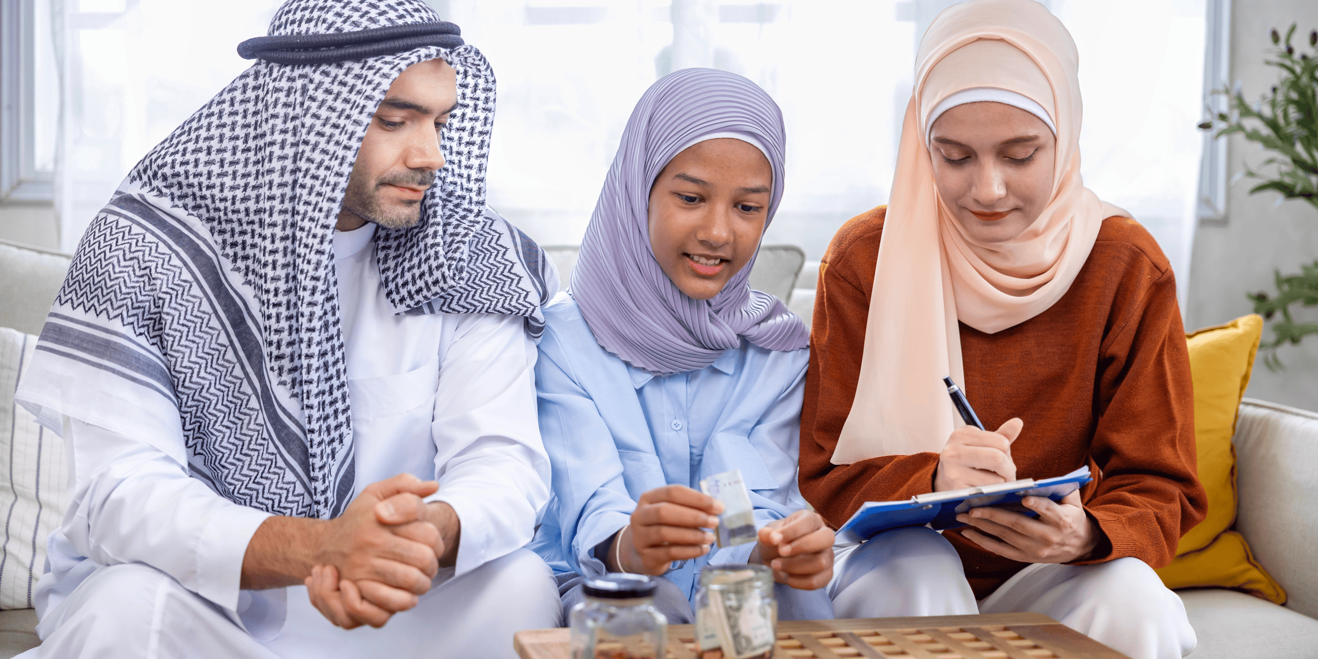 Teen Financial Literacy - Family going over their budget sitting in the living room