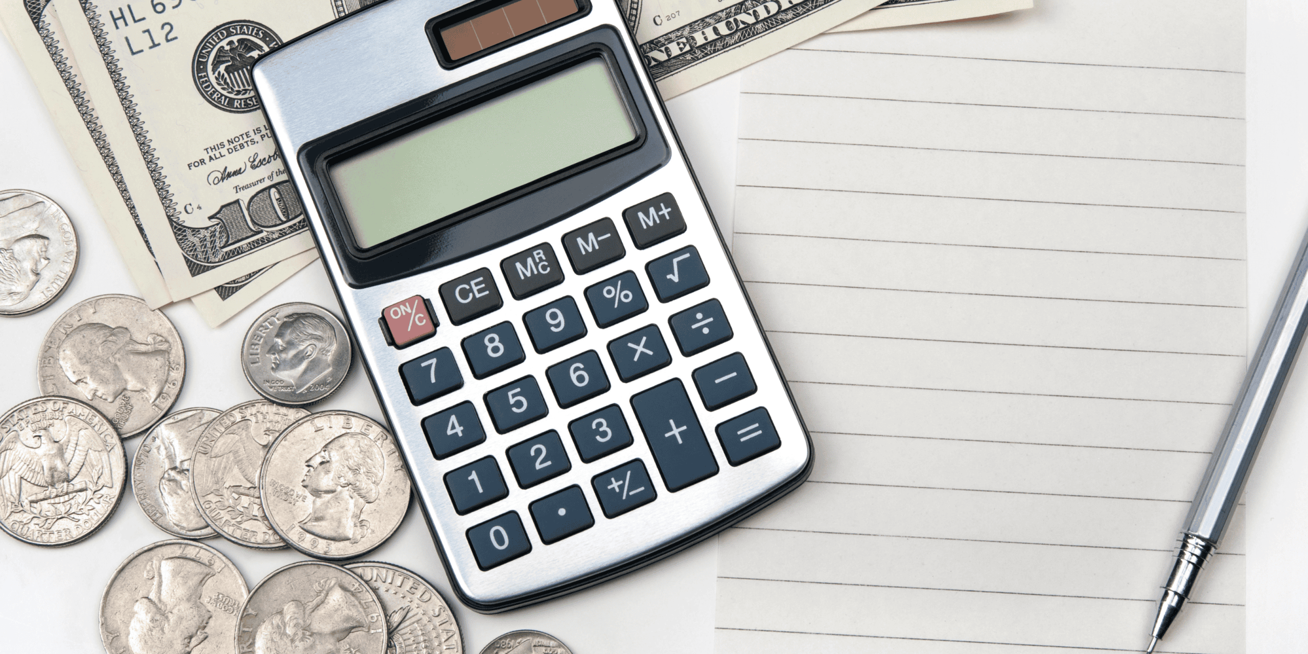 Calculator on top of notepad - teen spend tracker