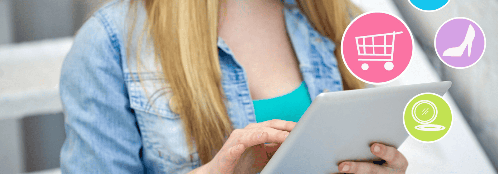 Teen holding tablet while shopping online - Teen Money Mistakes