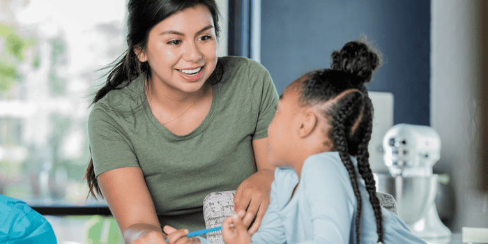 Teenager playing with small child - Teens can make money