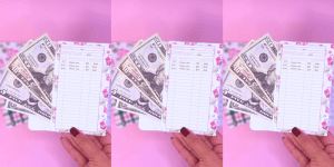 Female hands holding pink hydrangea cash envelopes - Budget Envelopes for Teen Beginners