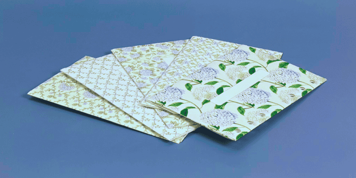 5 Blue Hydrangea Cash Envelopes layed out - Budget Envelopes for Teen Beginners