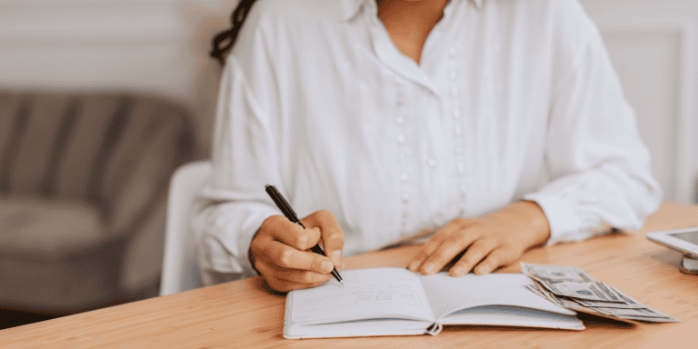 Young Female writing into her journal - Money gifts that teach