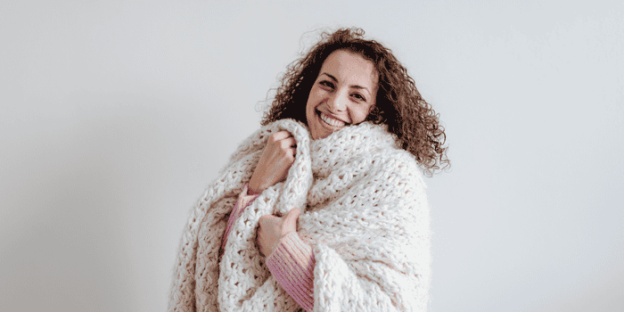 Young female wrapping herself with a blanket/Blanket Gifts for Teen Girls